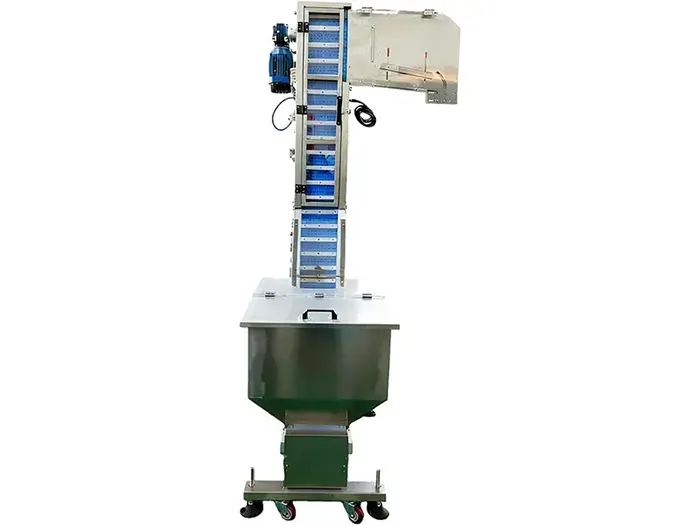 Elevatore e alimentatore automatico di tappi