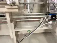 Riempitrice per liquidi con pompa a ingranaggi