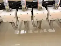 Riempitrice per liquidi con pompa a ingranaggi