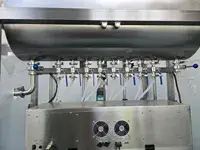 Riempitrice per liquidi con pompa peristaltica