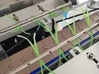 Etichettatrice automatica con manicotto termoretraibile