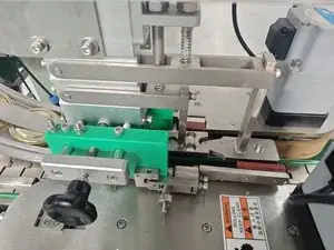 Unità di posizionamento del tappo